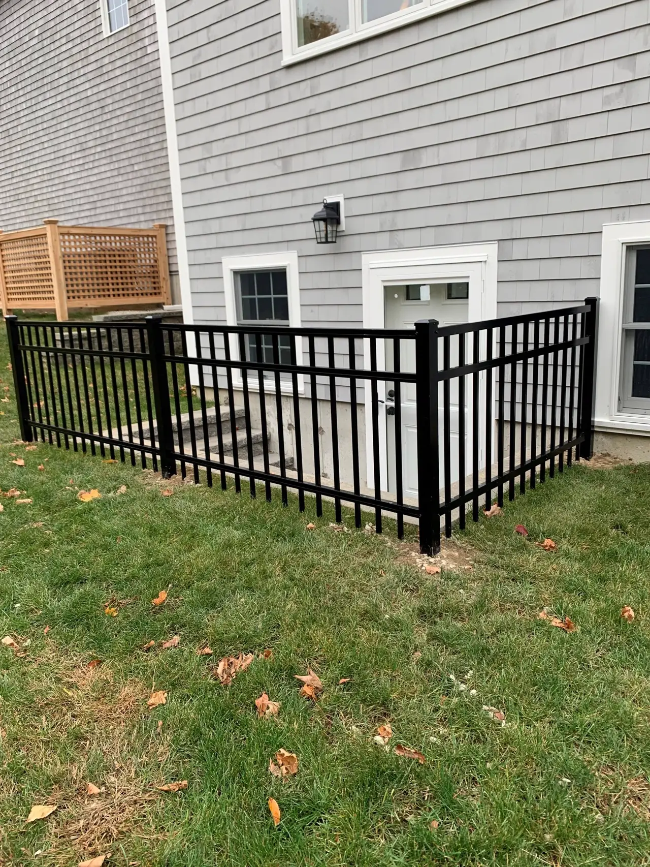 Ornamental aluminum fence installed by Armstrong Fence on the South Shore of Massachusetts