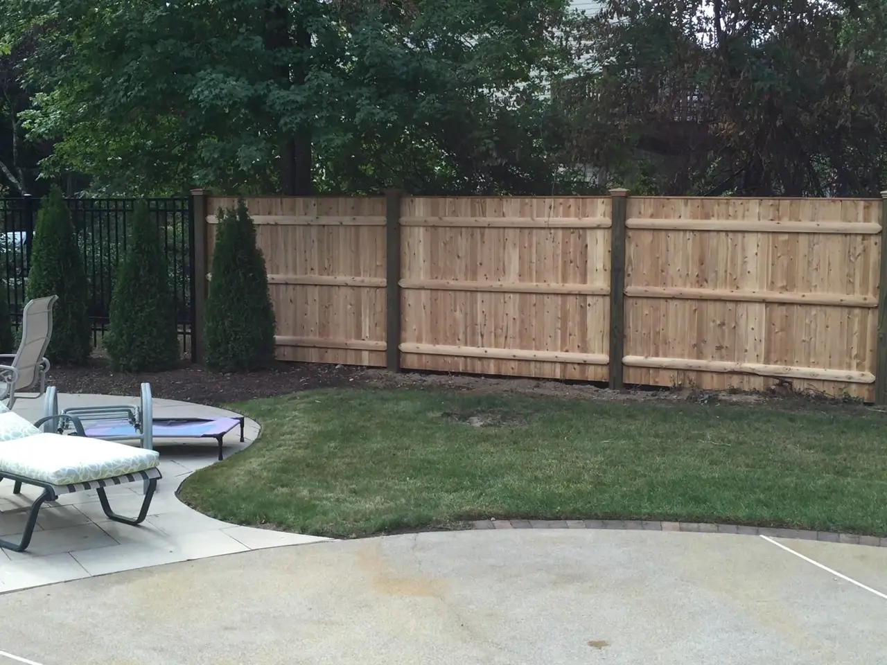 Custom cedar fence installed by Armstrong Fence on the South Shore of Massachusetts