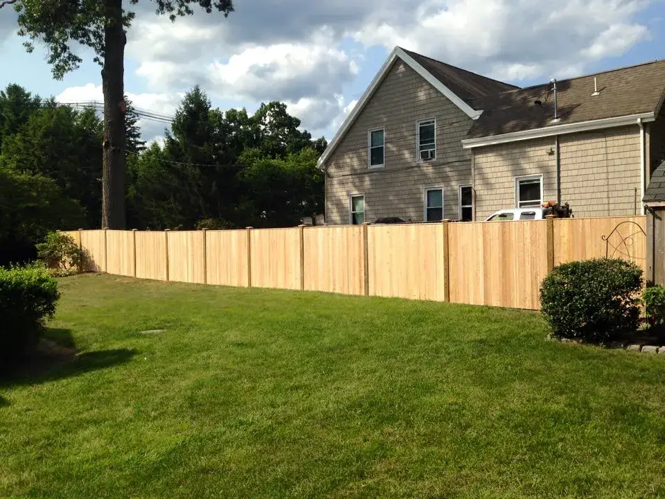 Custom cedar fence installed by Armstrong Fence on the South Shore of Massachusetts