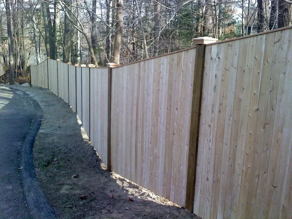 Custom cedar fence installed by Armstrong Fence on the South Shore of Massachusetts