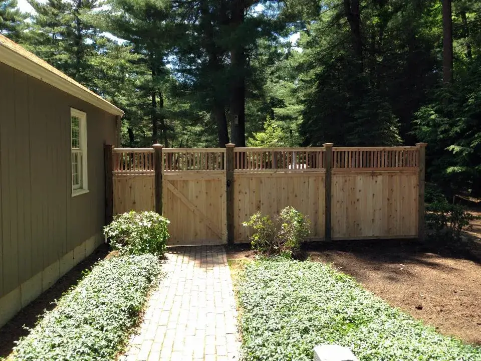 Custom cedar fence installed by Armstrong Fence on the South Shore of Massachusetts