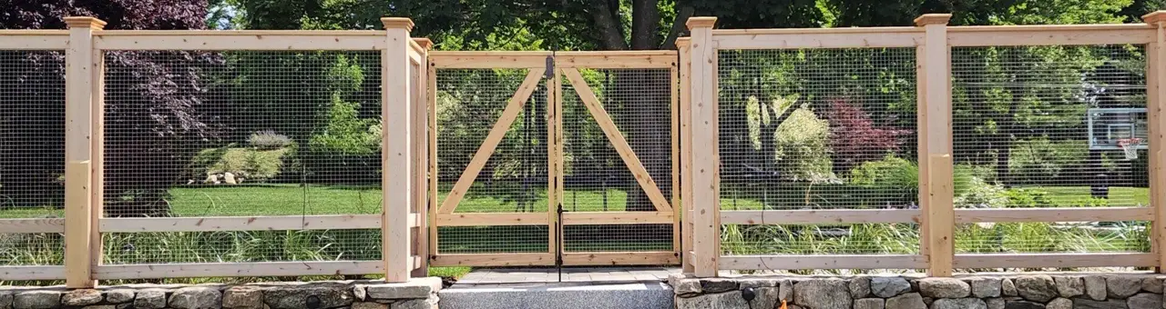 Custom cedar fence installed by Armstrong Fence on the South Shore of Massachusetts