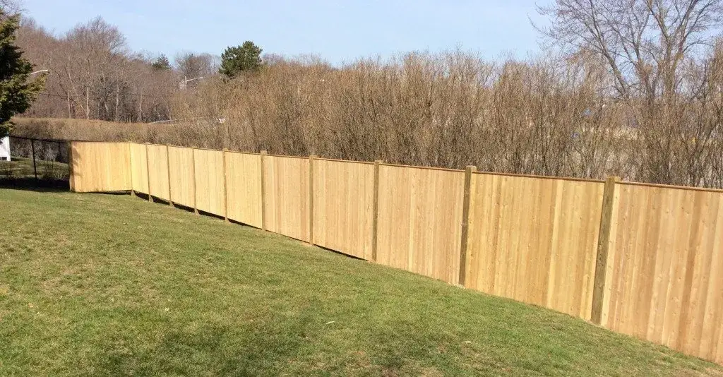Custom cedar fence installed by Armstrong Fence on the South Shore of Massachusetts