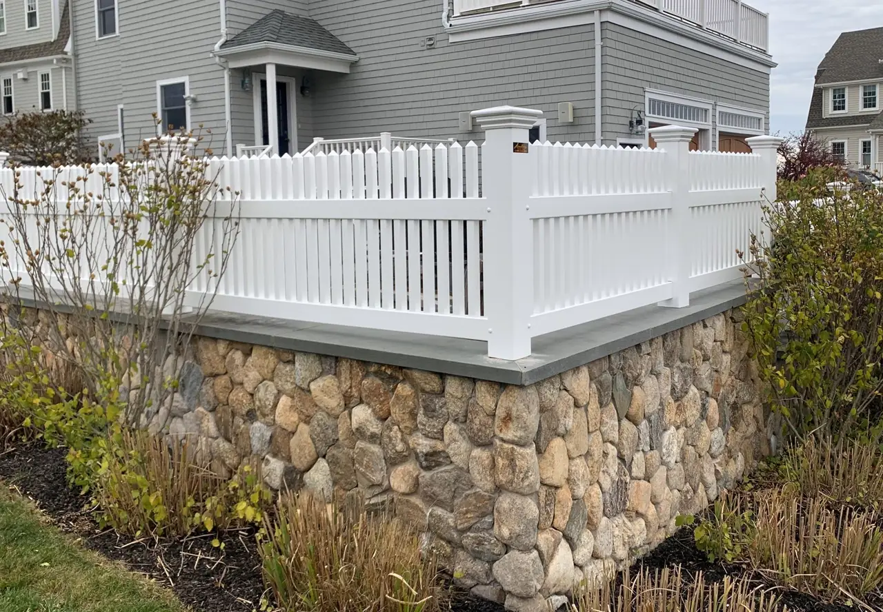 Manchester style vinyl fence installed by Armstrong Fence on the South Shore of Massachusetts