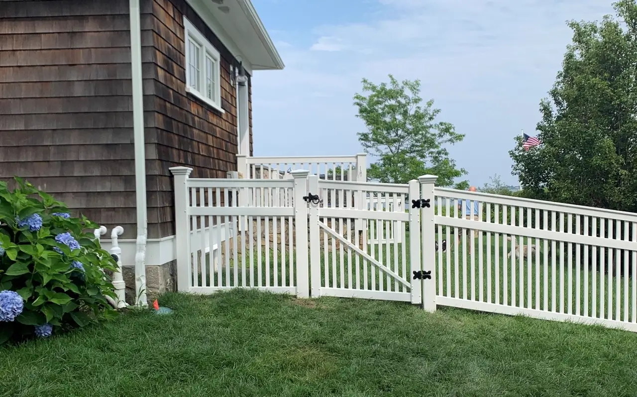 Custom vinyl fence installed by Armstrong Fence on the South Shore of Massachusetts
